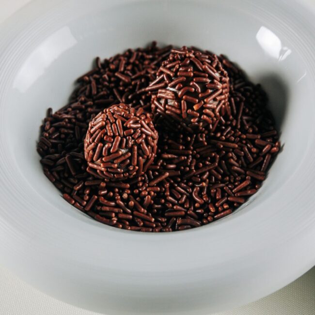 Brazilian brigadeiros rolled in chocolate sprinkles, served at Nic + Junior’s in River North, Chicago